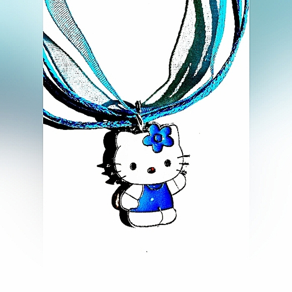 SOLD .......SOLD...,,......All In Blue Charm On A Blue Layered Ribbon Necklace - Picture 2 of 6